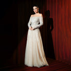 beige off-shoulder long sleeve evening gown front view