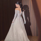 lace-up back detail of luxury sparkly prom dresss beige